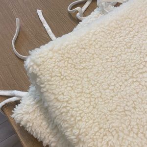 Set of (2) Sherpa seat cushions with ties